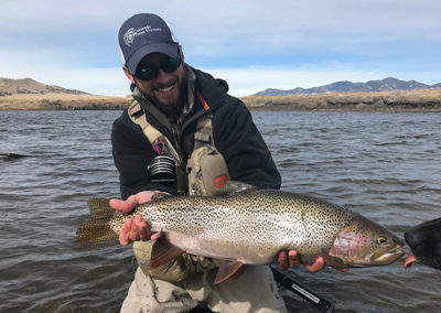 Danny Frank with a Dream Stream Lake Run Rainbow.