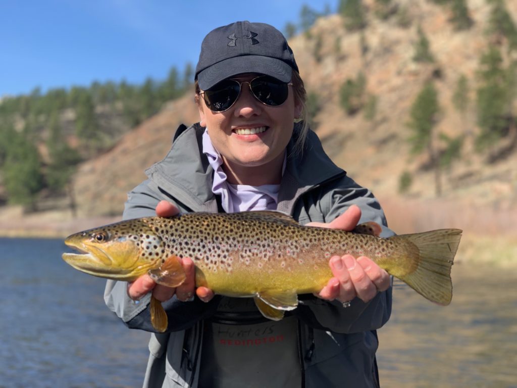 Her first day fly fishing and she landed some great brown trout with Colorado Trout Hunters.