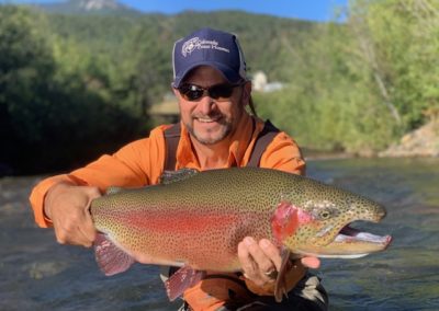 Jim Keller fish a huge Colorado rainbow trout from the Platte!