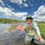 Giant cutthroat trout that at a green drake dry fly at the Rolling J Ranch.