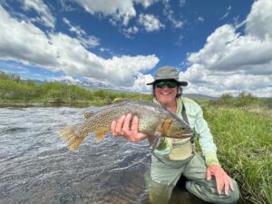 Giant cutthroat trout that at a green drake dry fly at the Rolling J Ranch.