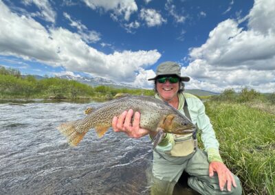 Giant cutthroat trout that at a green drake dry fly at the Rolling J Ranch.