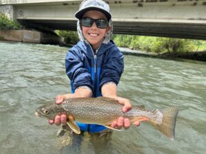 Take a kid fishing! Our buddy David with a nice tiger trout.