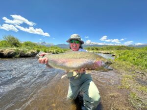 Enormous trout that ate a green drake dry fly at Rolling J Ranch.