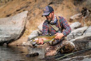 Scott Dickson with a big South Platte River Rainbow