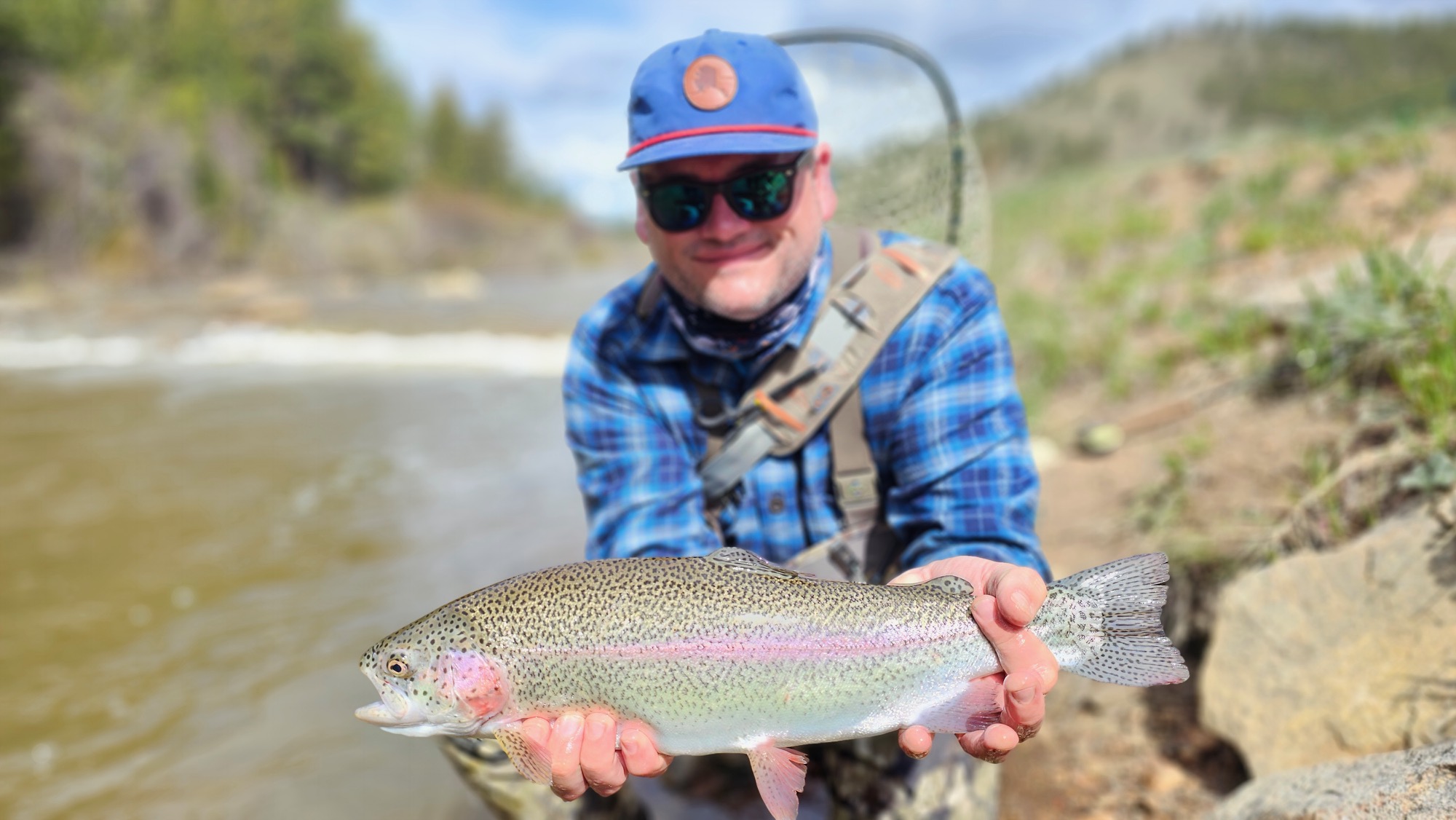 A great rainbow from a private water guided fly fishing trip near Denver!