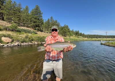 Wet wading on a summer guided fly fishing trip at Abell River Ranch.