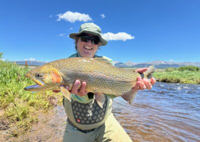 Big trout landed on a guided fly fishing trip near Denver