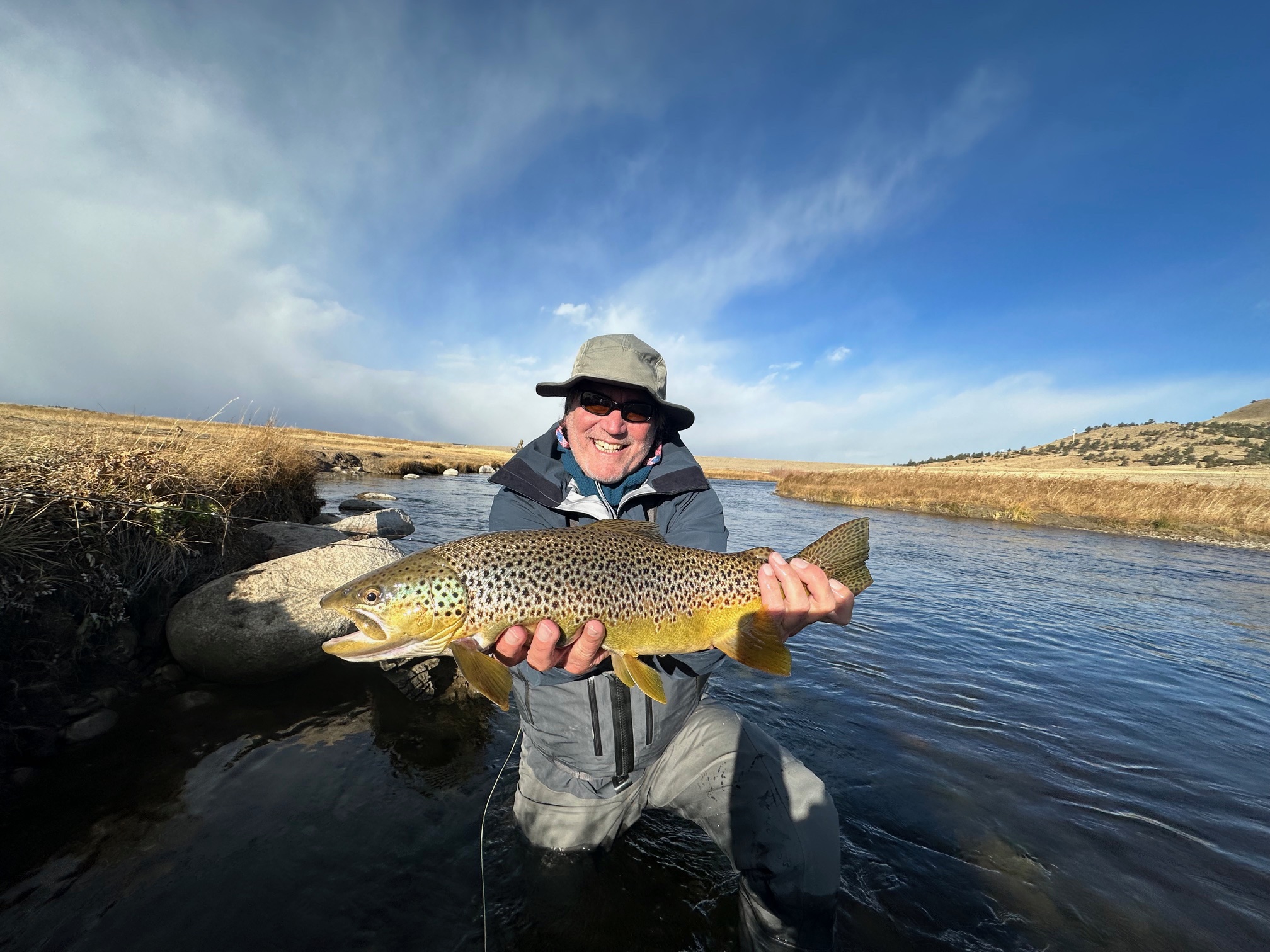 Big lake run fish landed on a guided fly fishing trip to the Dream Stream