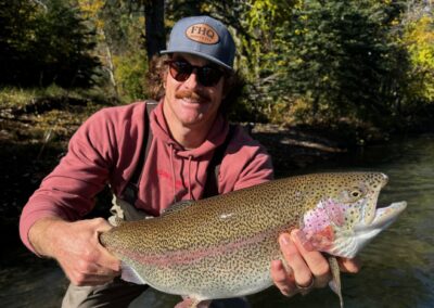 Major League Baseball Player Miles Mikolas with a giant Rainbow Trout landed on a guided fly fishing trip with Colorado Trout Hunters.